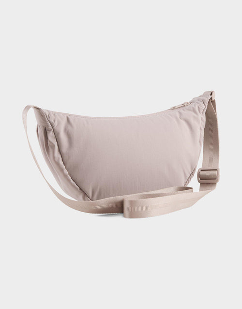 Her Half Moon Bag
