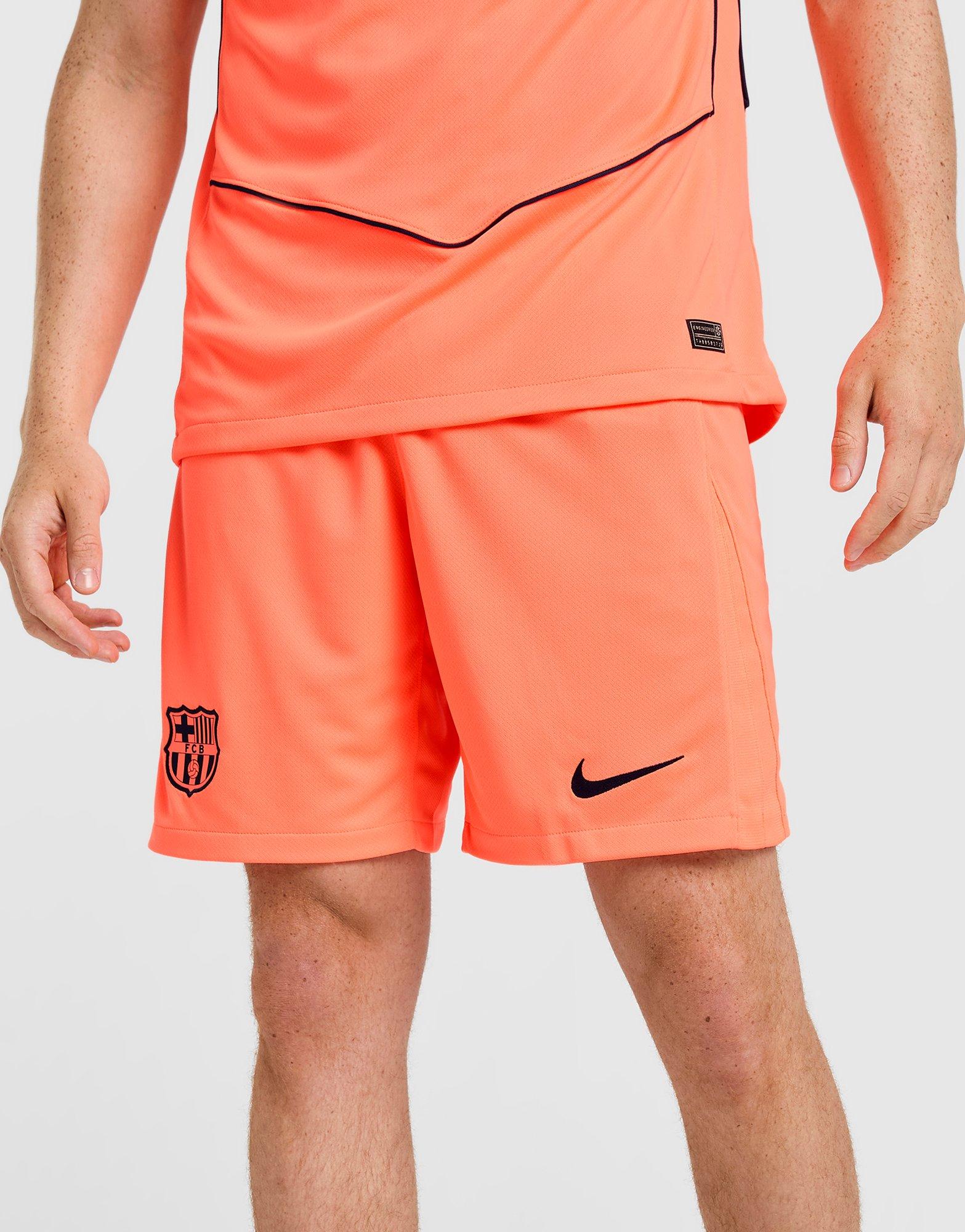 orange nike soccer shorts