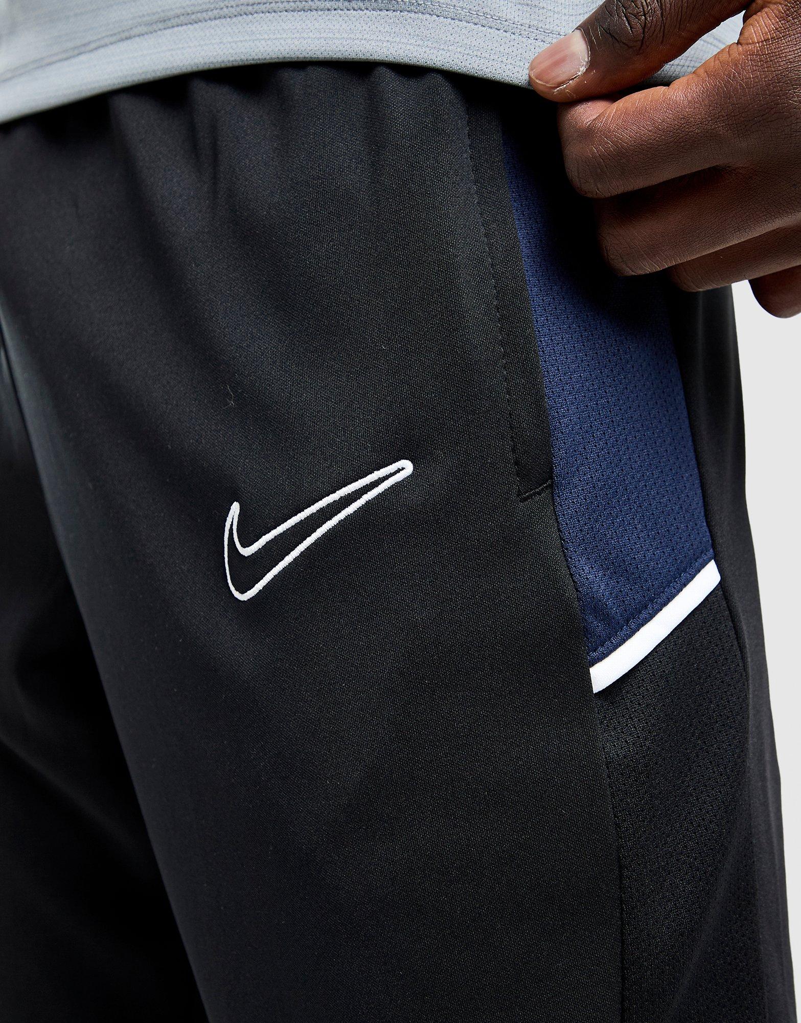 nike track pants mens with zipper pockets