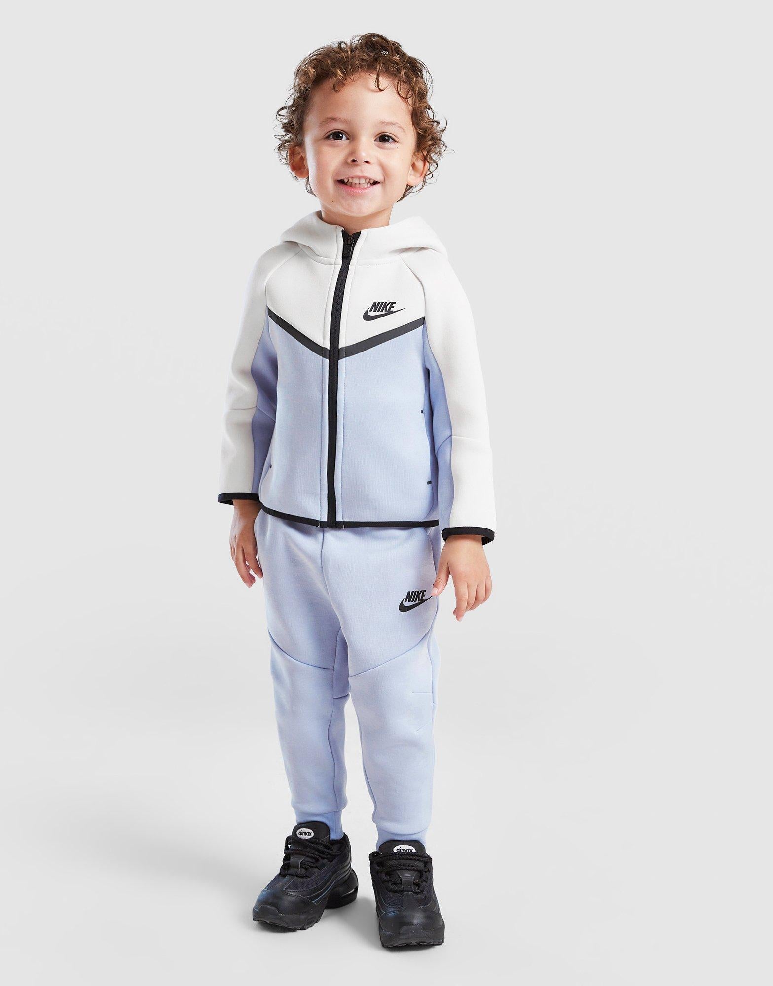 nike tech fleece tracksuit blue and white