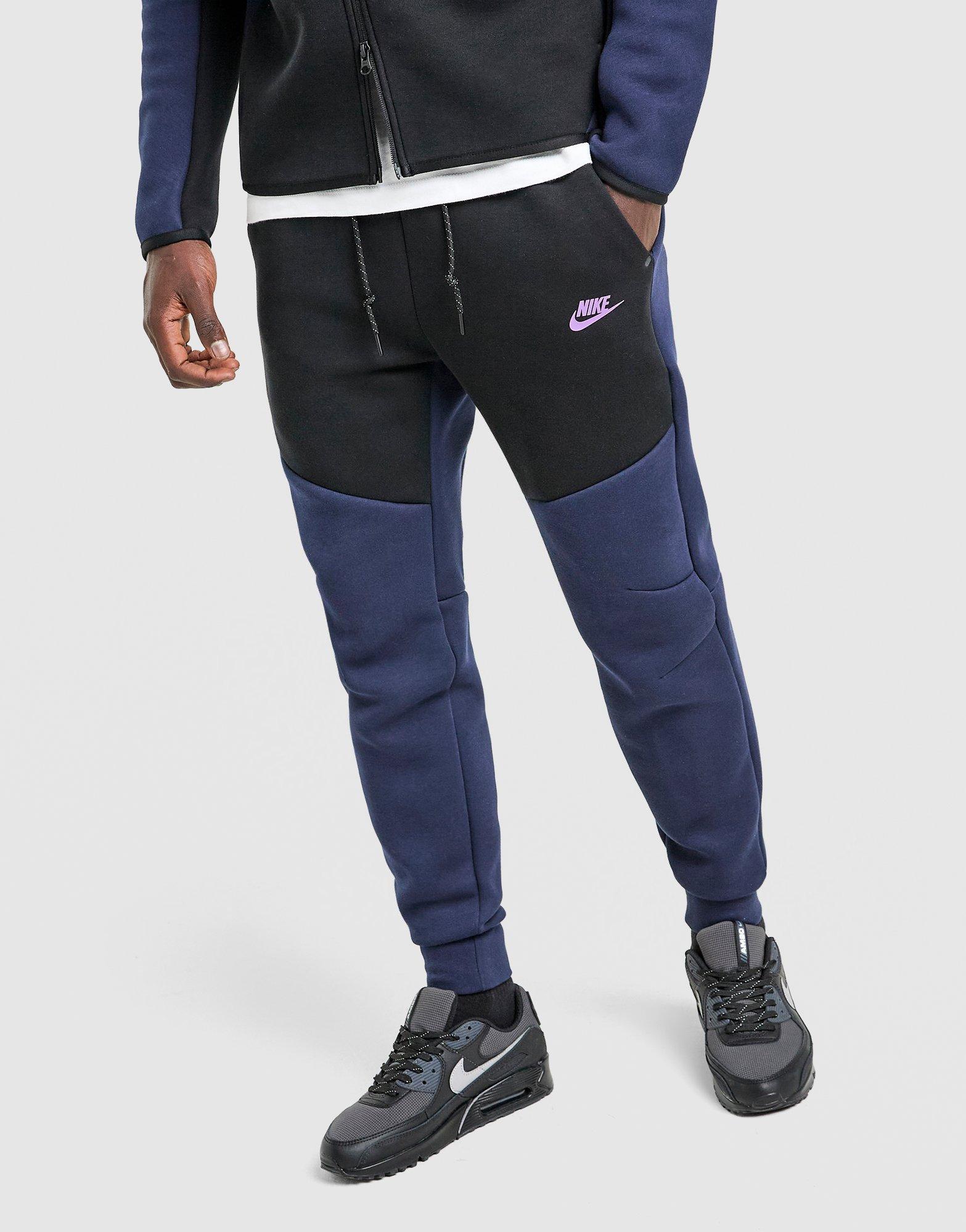 nike tech blue and black joggers