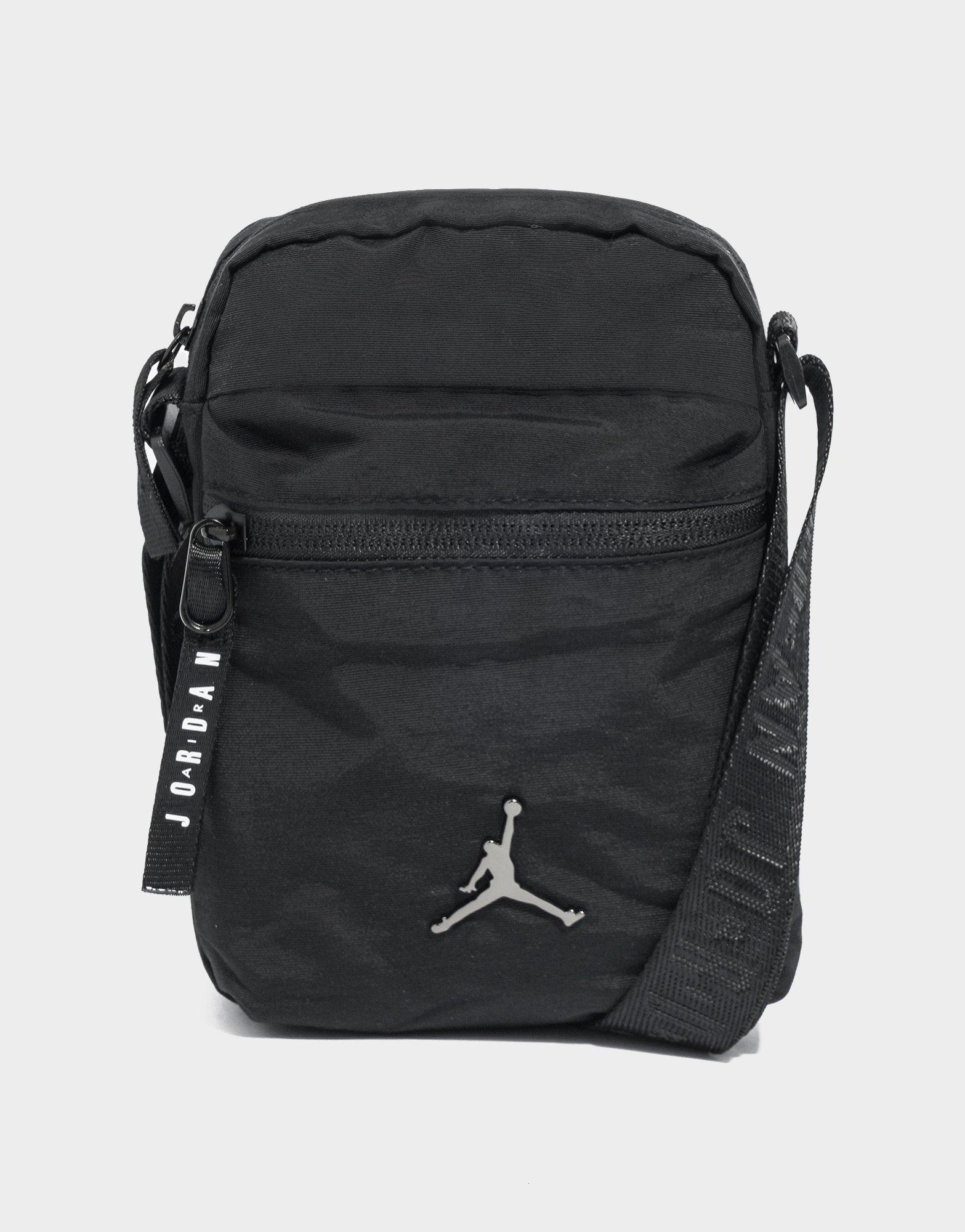 nike air jordan jumpman sling backpack (One Size, Carbon Heather) (Carbon Heather/White/Gold, One Size) Synthetic. Air Jordan "Jumpman by Nike"