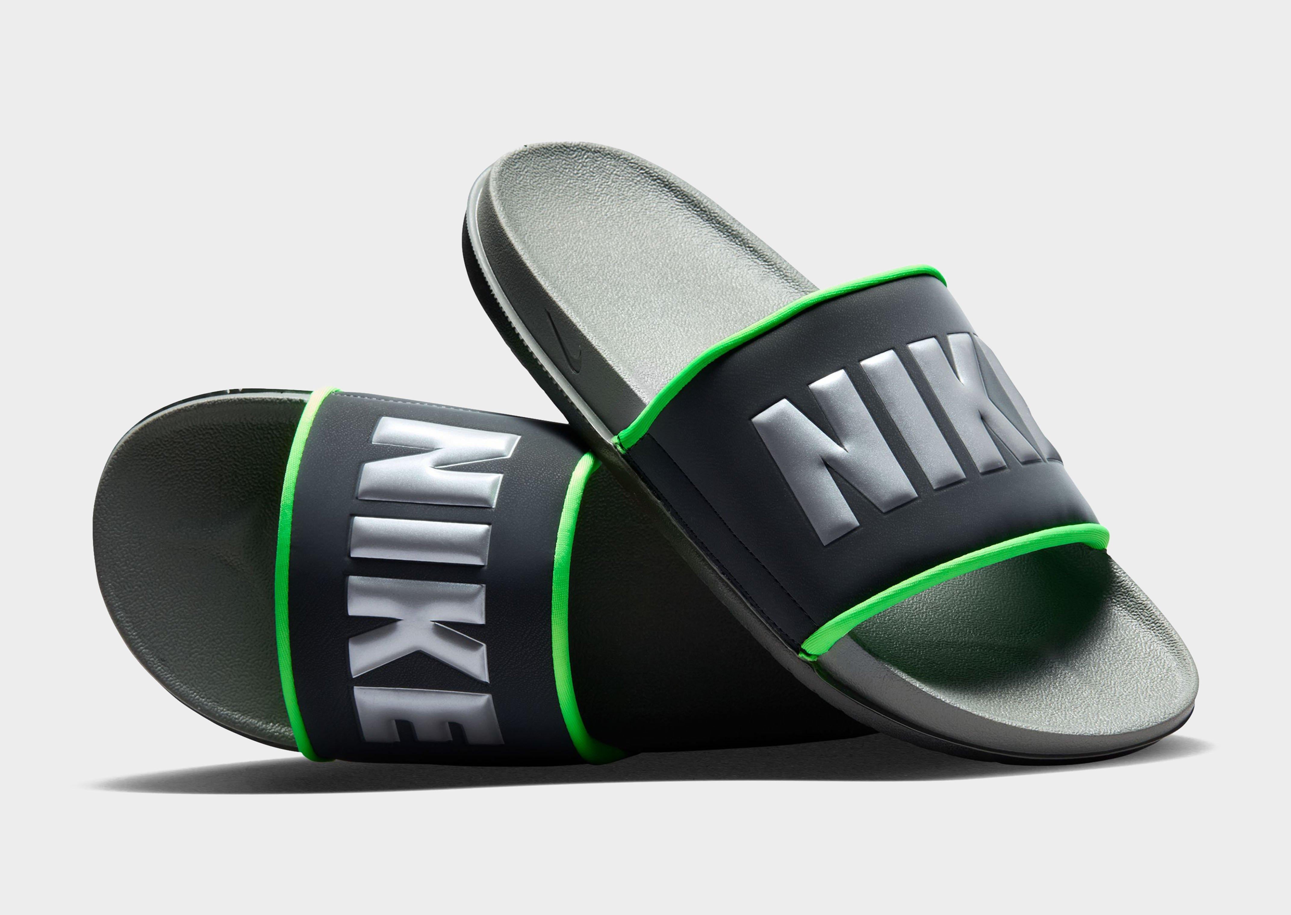 black and green nike slides