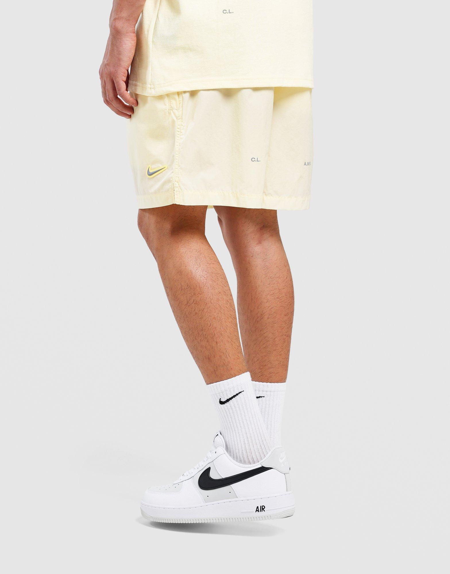 Yellow Nike Nocta CS Woven Shorts (Unisex) - JD Sports Singapore