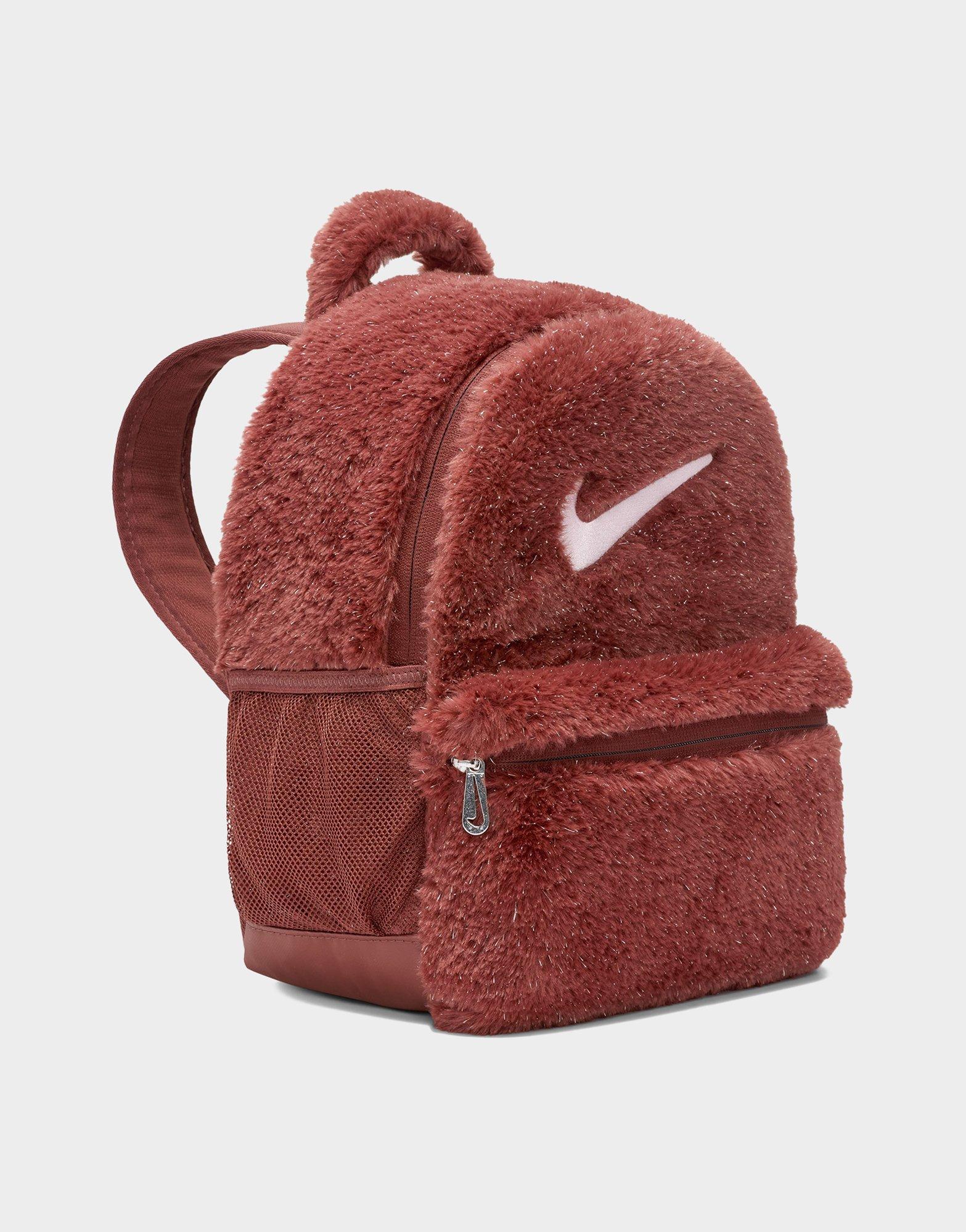 バッグ fur docking nylon backpack Nike Sportswear Futura Faux Fur Mini Backpack (6L). Nike SG