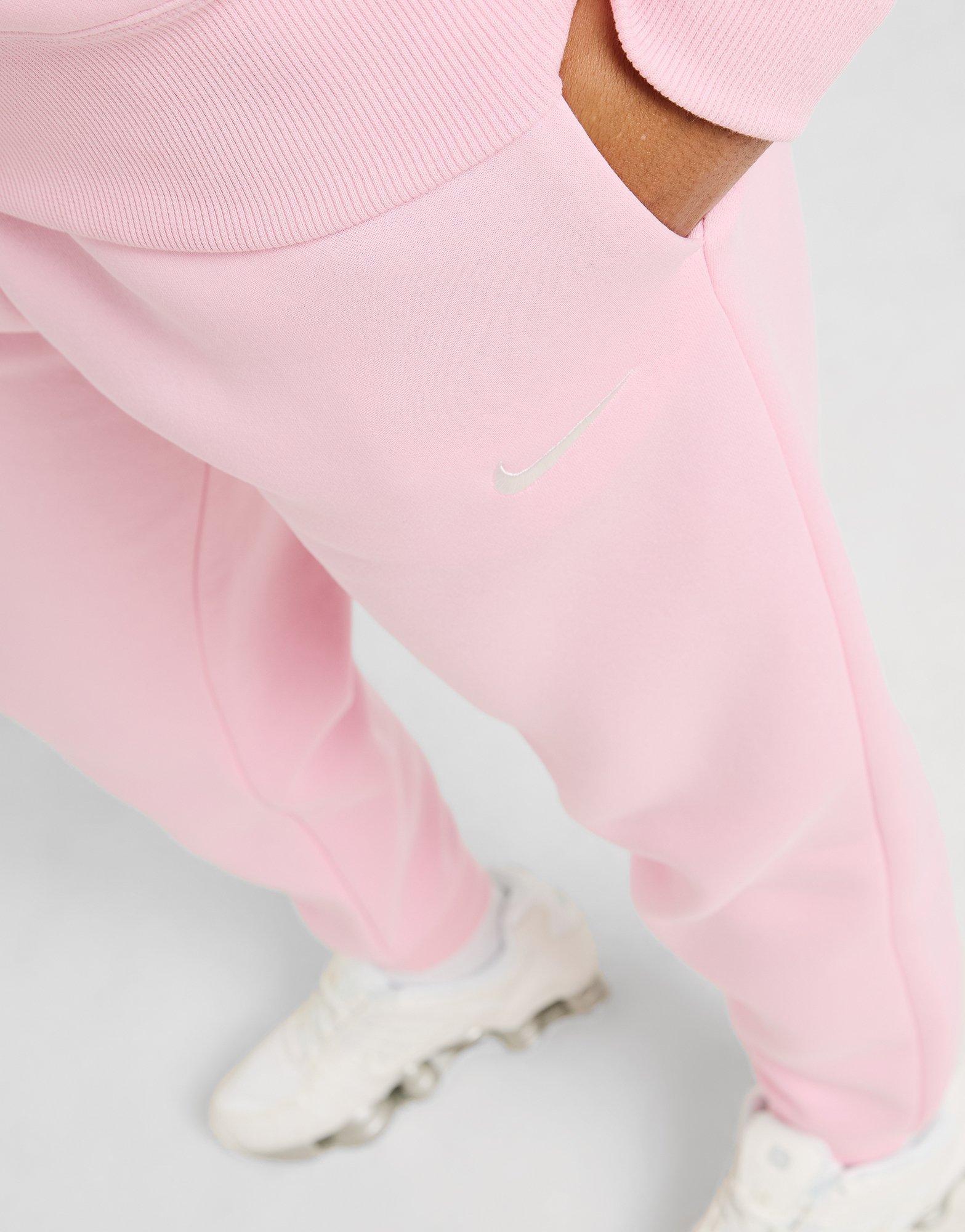 tight nike tracksuit bottoms
