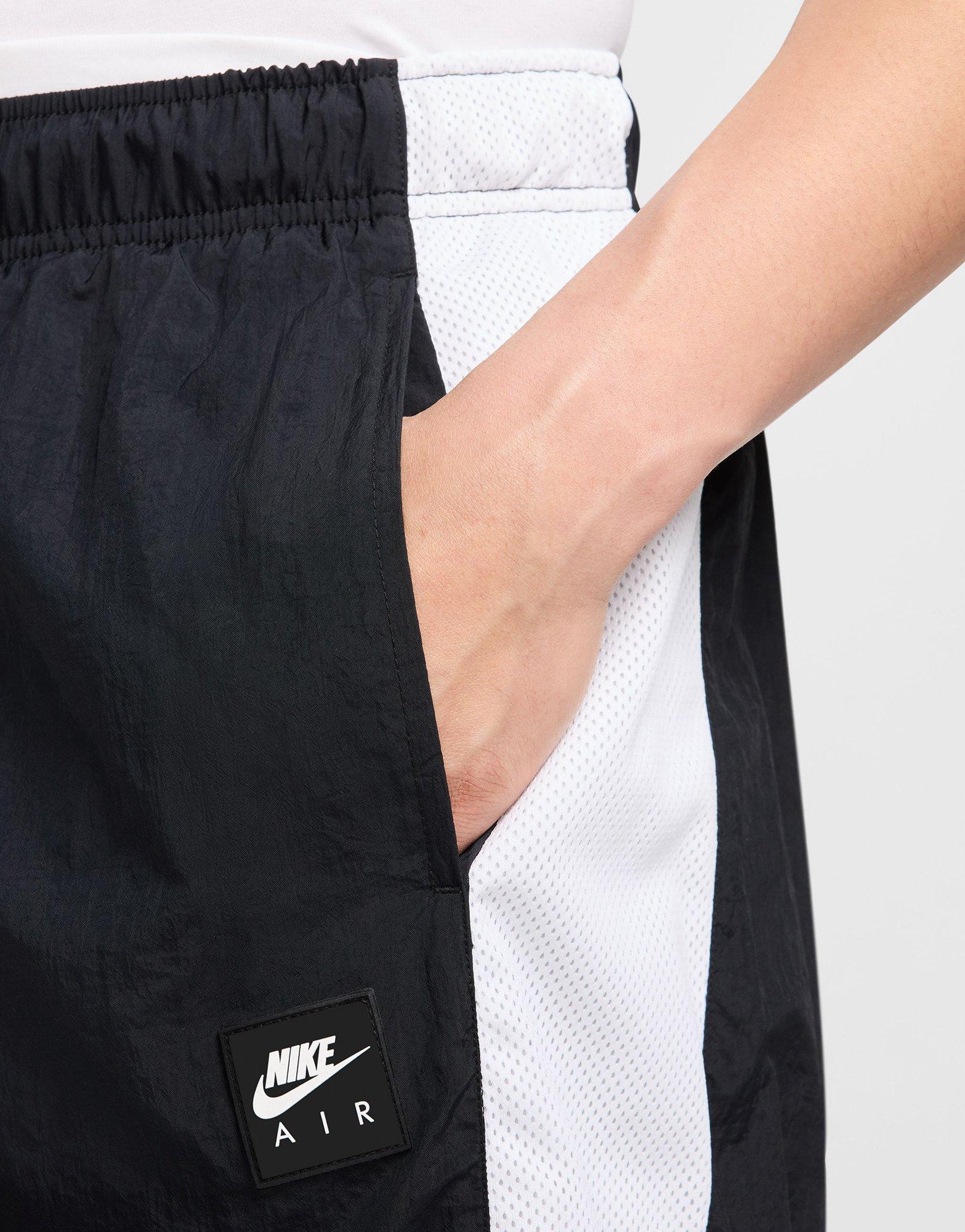 nike sportswear men's woven trousers