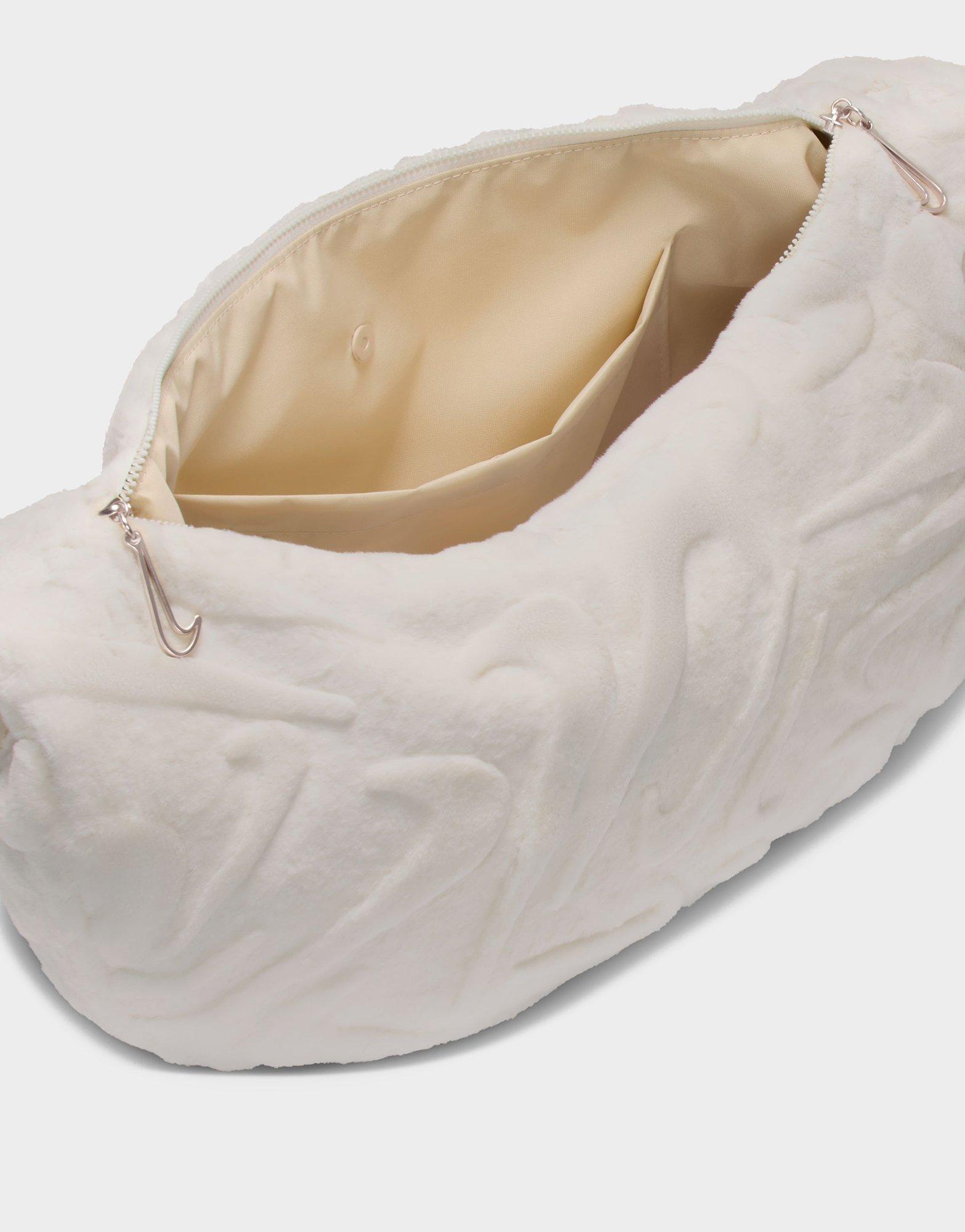 Beige Nike Sportswear Faux Fur Slouchy Bag (19L) - JD Sports Singapore